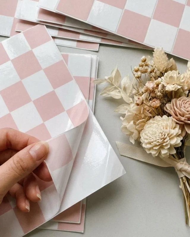 Pink checkerboard peel-and-stick tiles for DIY home decor