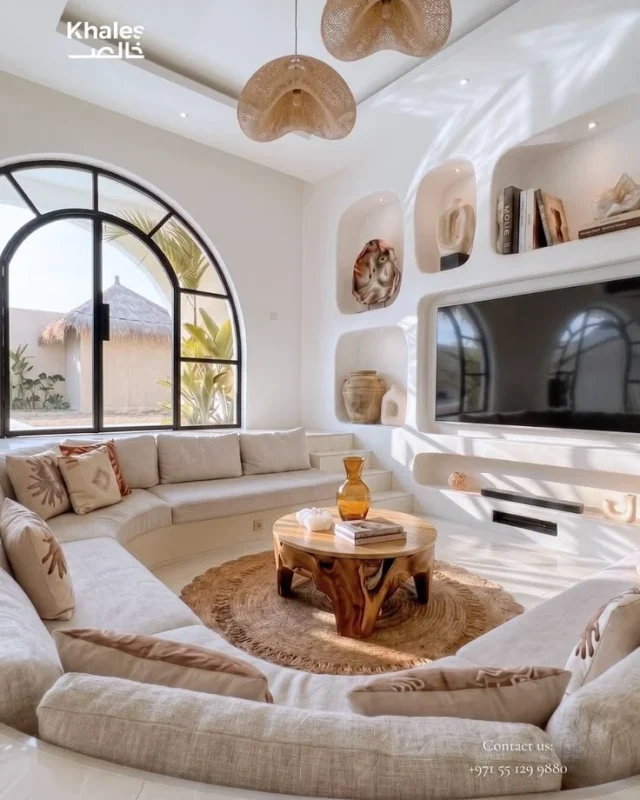 Stylish sunken living room design showcasing modern decor and cozy seating.